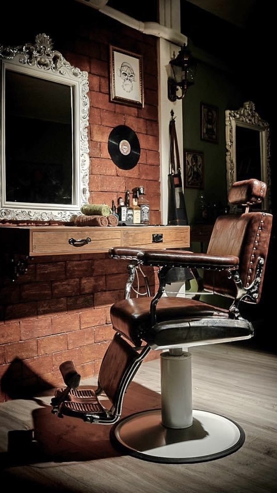 Inside Bad Monkey Barber Shop Patong — chairs and tools.